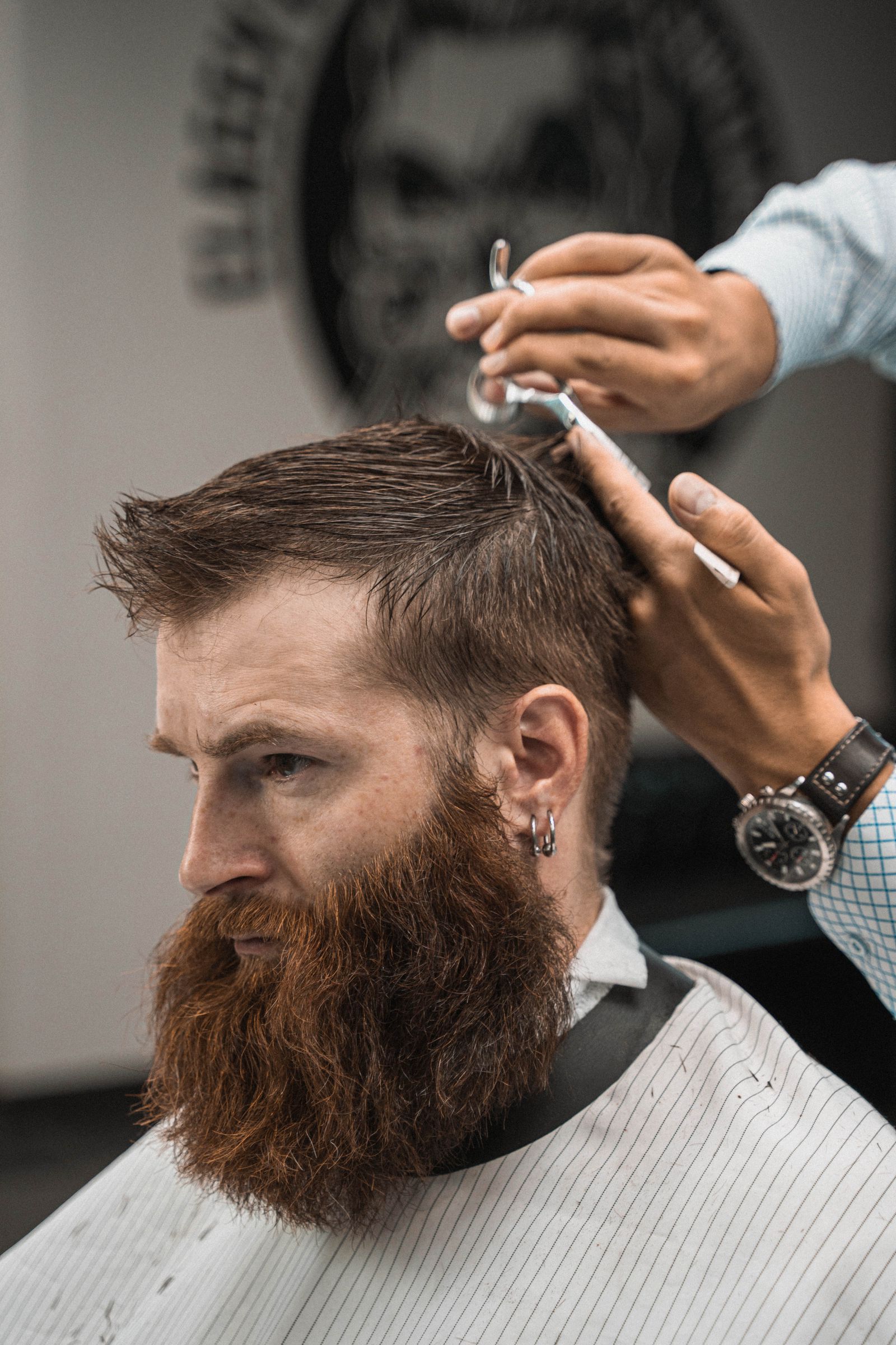 A bearded man in a barber shop