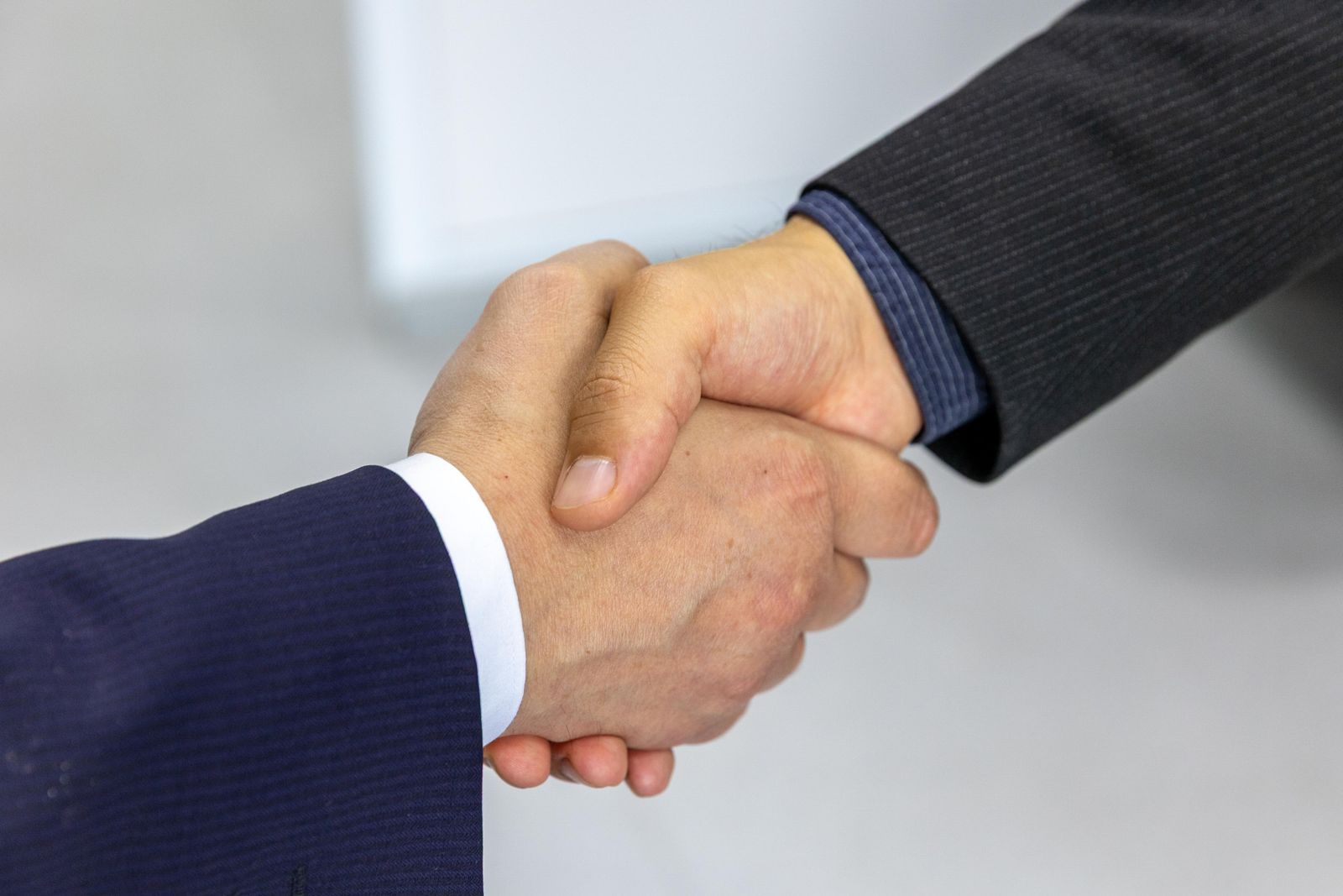 A handshake closing a business deal
